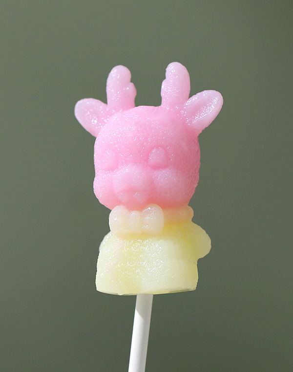 米唐たき動(dòng)物派對(duì)棒棒糖-小鹿馬卡龍紅黃.jpg